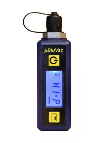 Digital micron gauge used to prove deep vacuum and moisture control before refrigerant charging